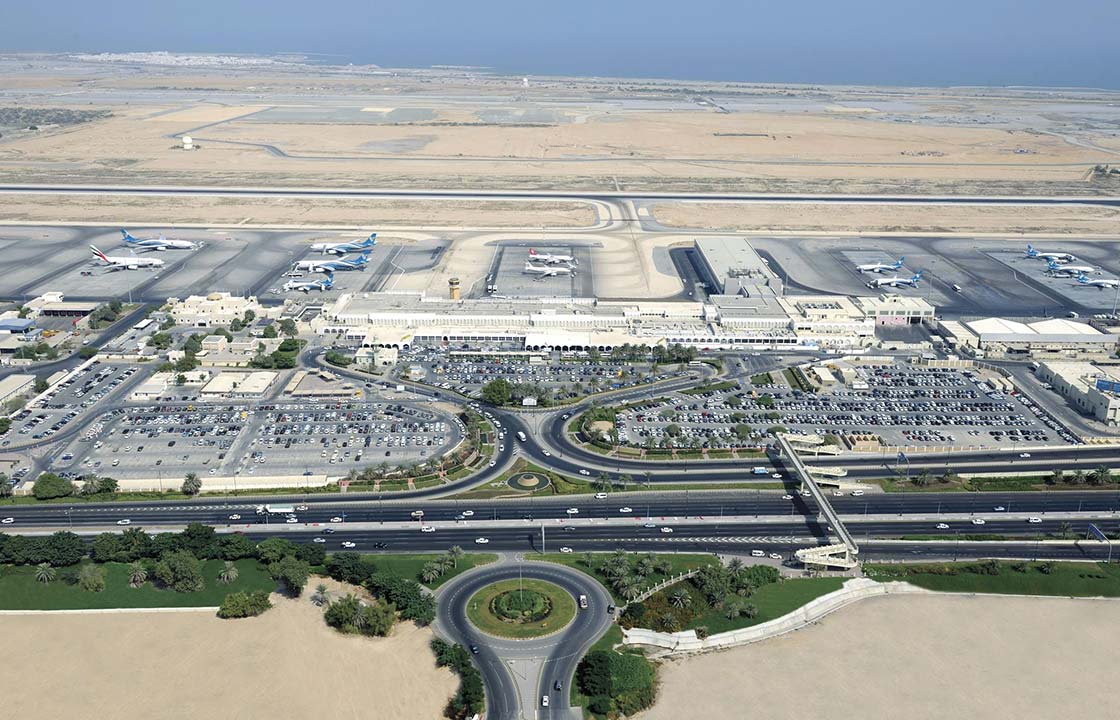 An arial view of the Muscat International Airport in Muscat Oman surrounded by a desert