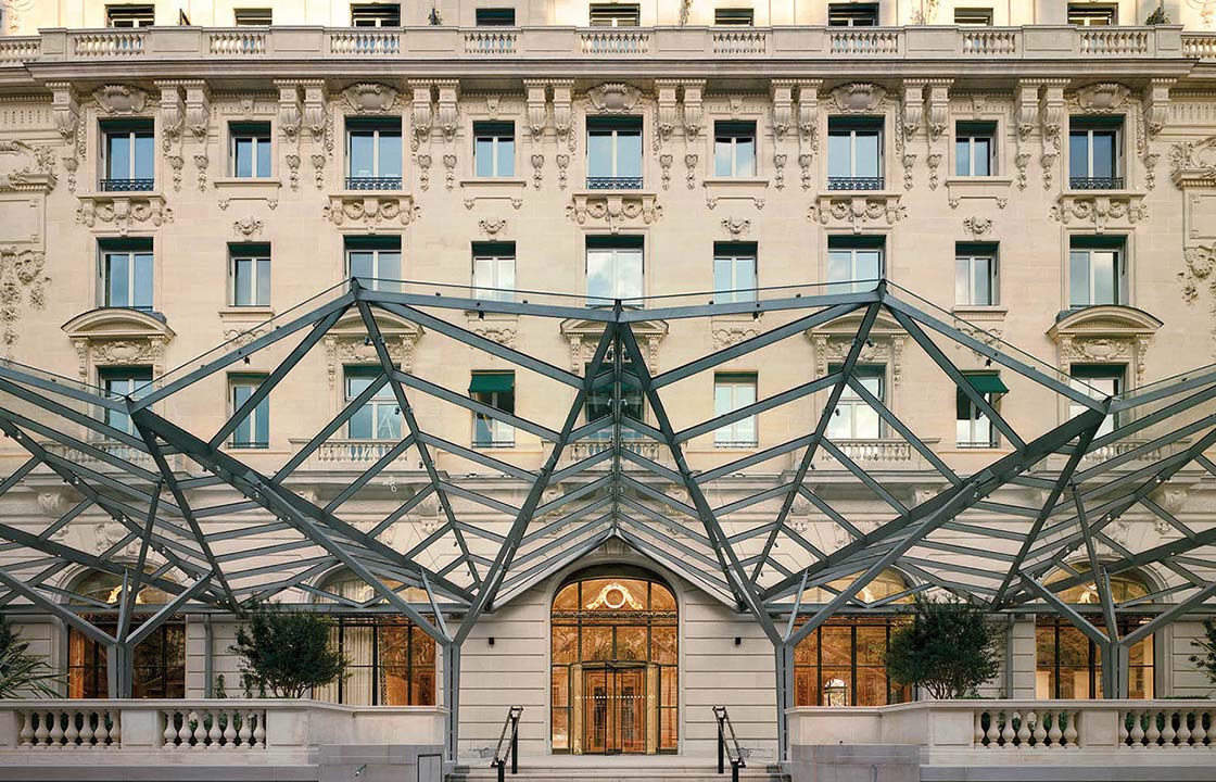 The glass and metal marquee at the front of the Peninsula hotel in Paris